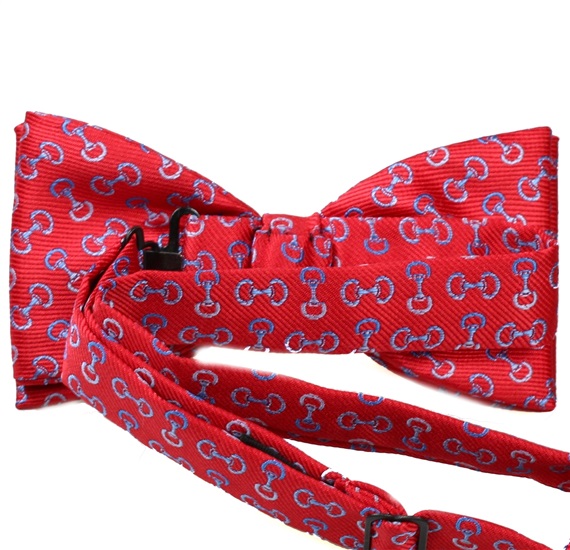 Red bow tie with blue designs riding reverse