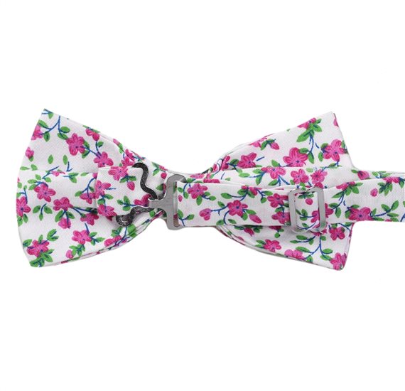 Reverse white bow tie with fuchsia and green flowers