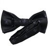 Reverse black bow tie with skulls