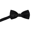 Reverse black bow tie with white dots
